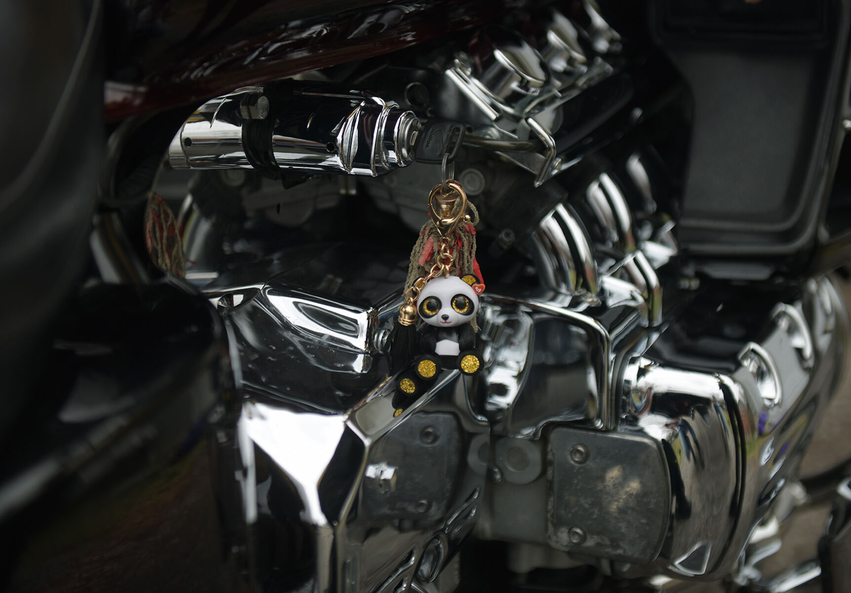 Holman's keys rest in the ignition of his bike